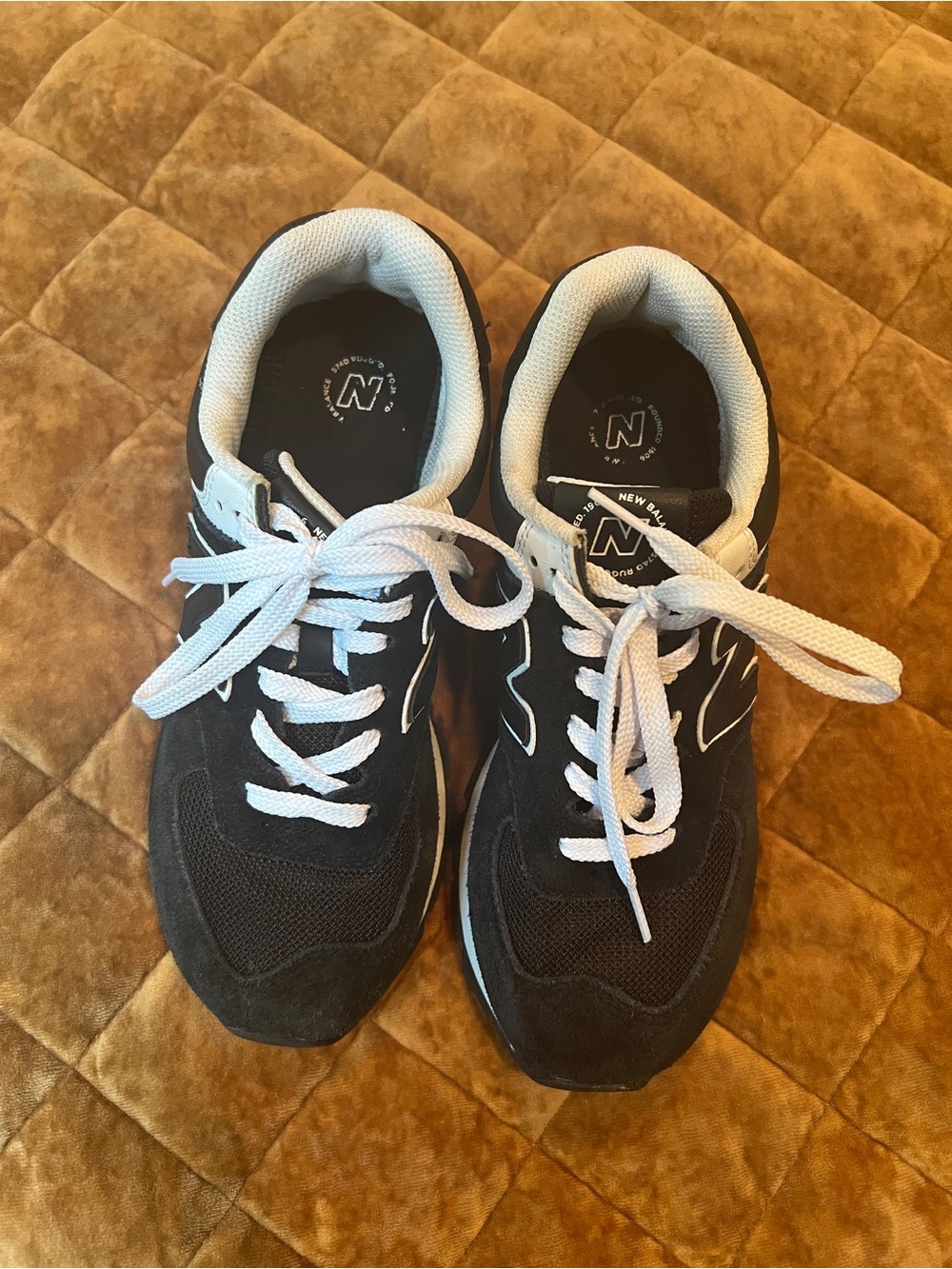 New Balance Women's 574 Core Sneaker
Black and white size 8.5